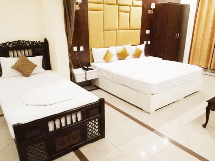 Hotel Pak Continental Мултан Экстерьер фото