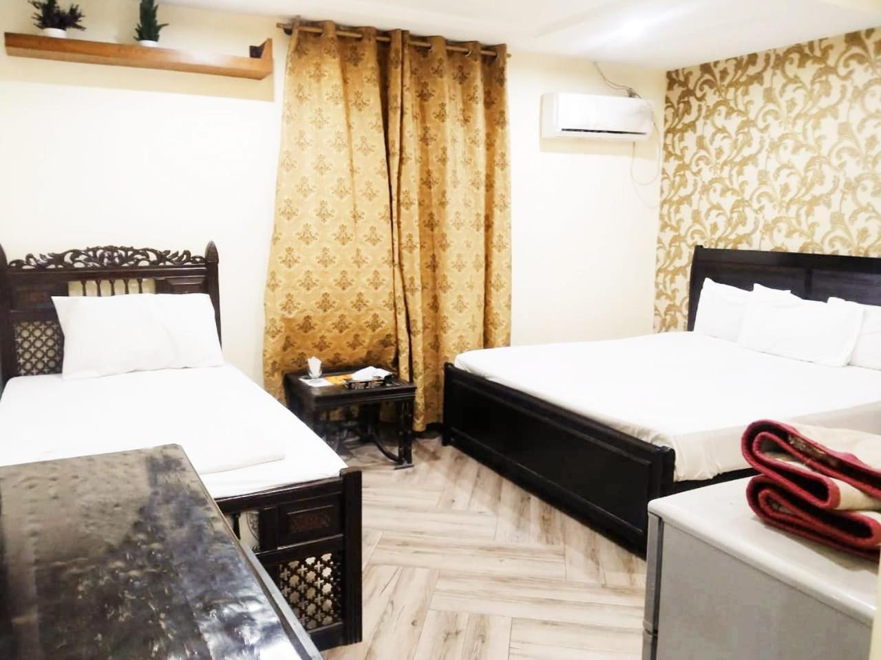 Hotel Pak Continental Мултан Экстерьер фото